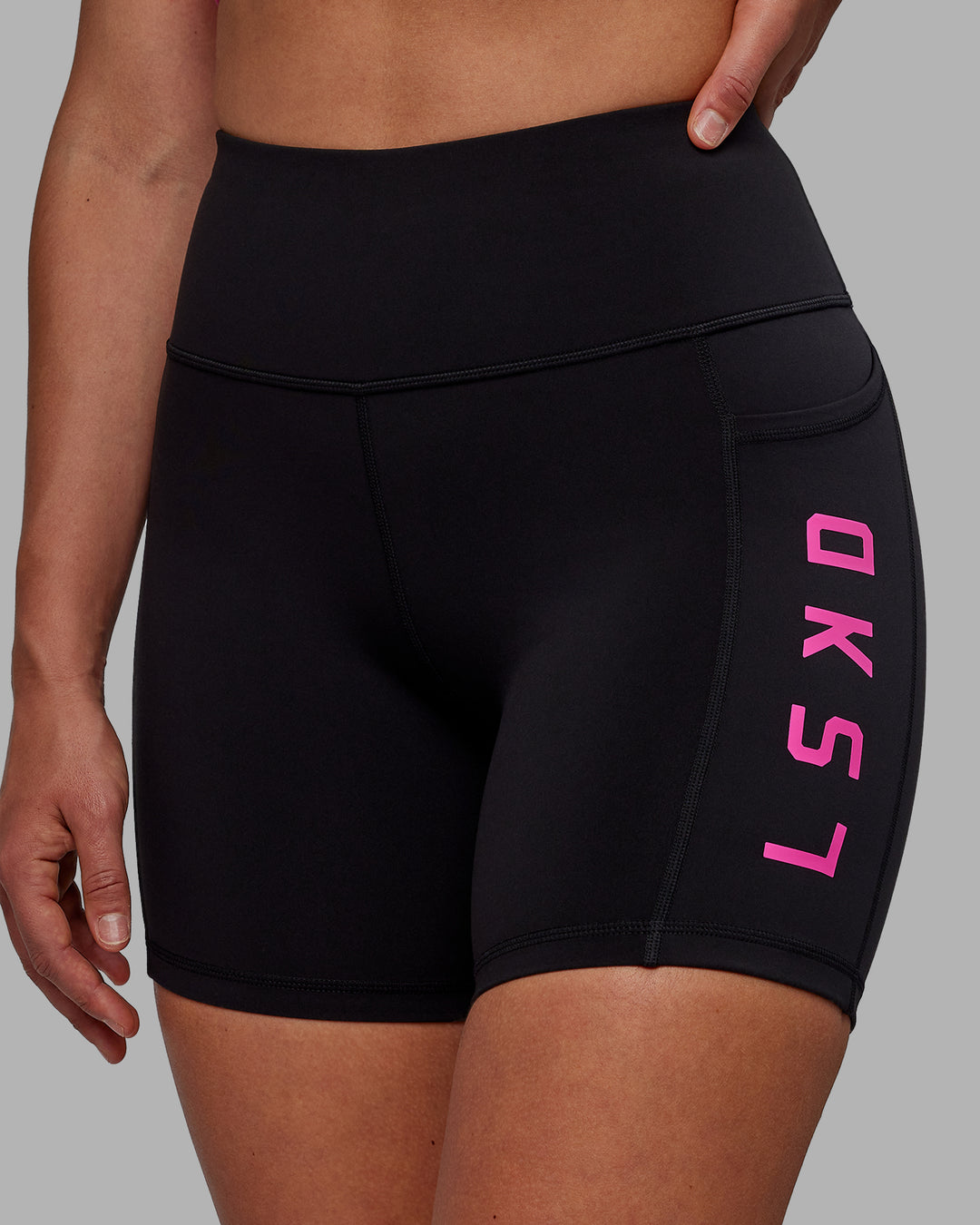 Woman wearing Rep Mid Short Tights - Black-Fuchsia Pink