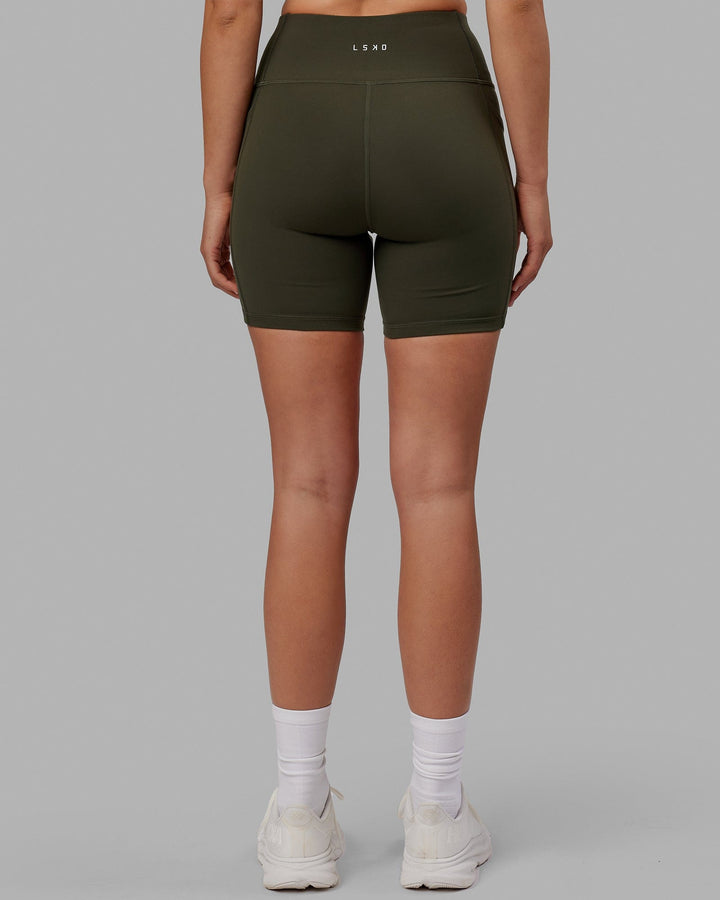 Woman wearing Rep Mid Short Tight - Forest Night