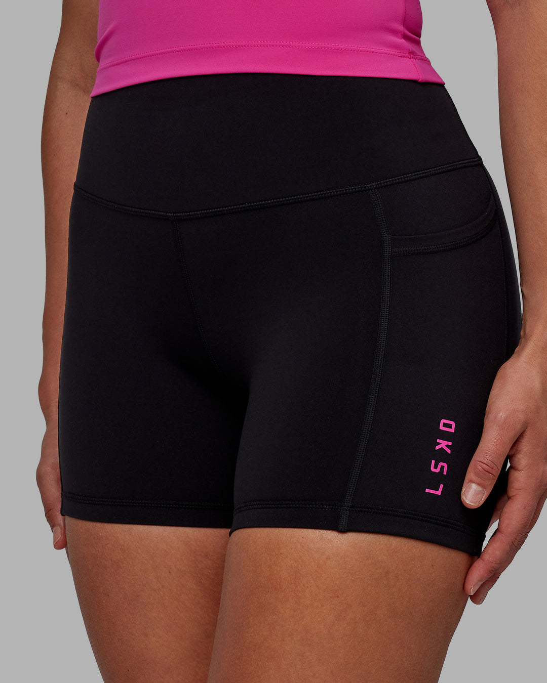 Woman wearing Rep X-Short Tights - Black-Fuchsia Pink