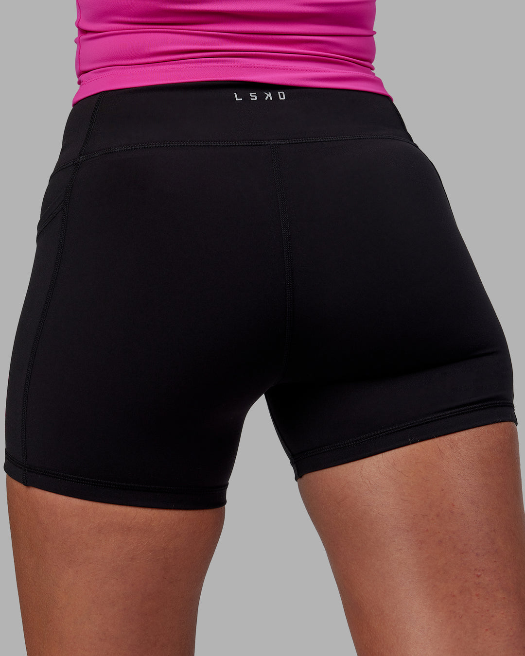 Woman wearing Rep X-Short Tights - Black-Fuchsia Pink