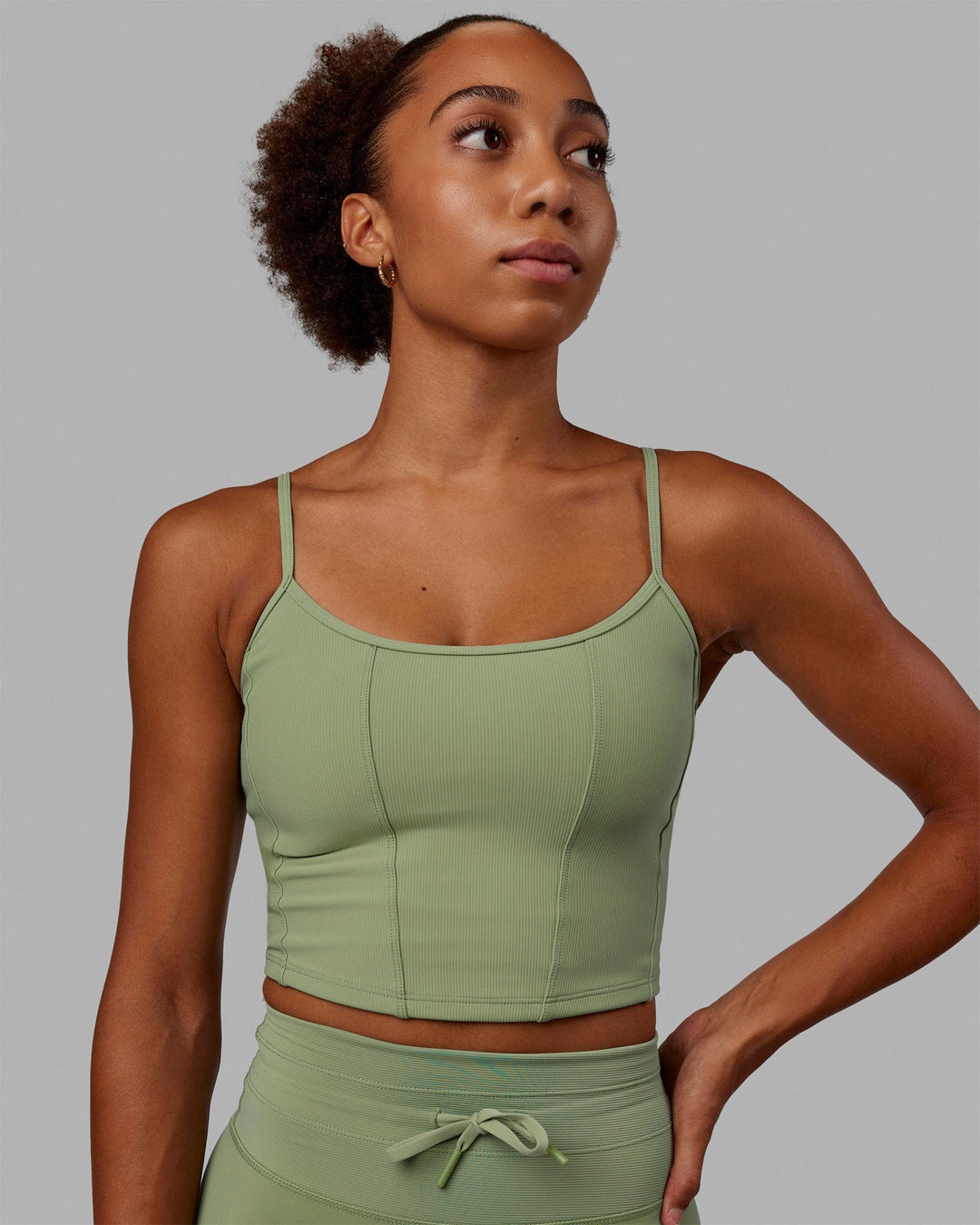 Woman wearing Resistance Ribbed Shelf Bra Performance Tank - Bayleaf