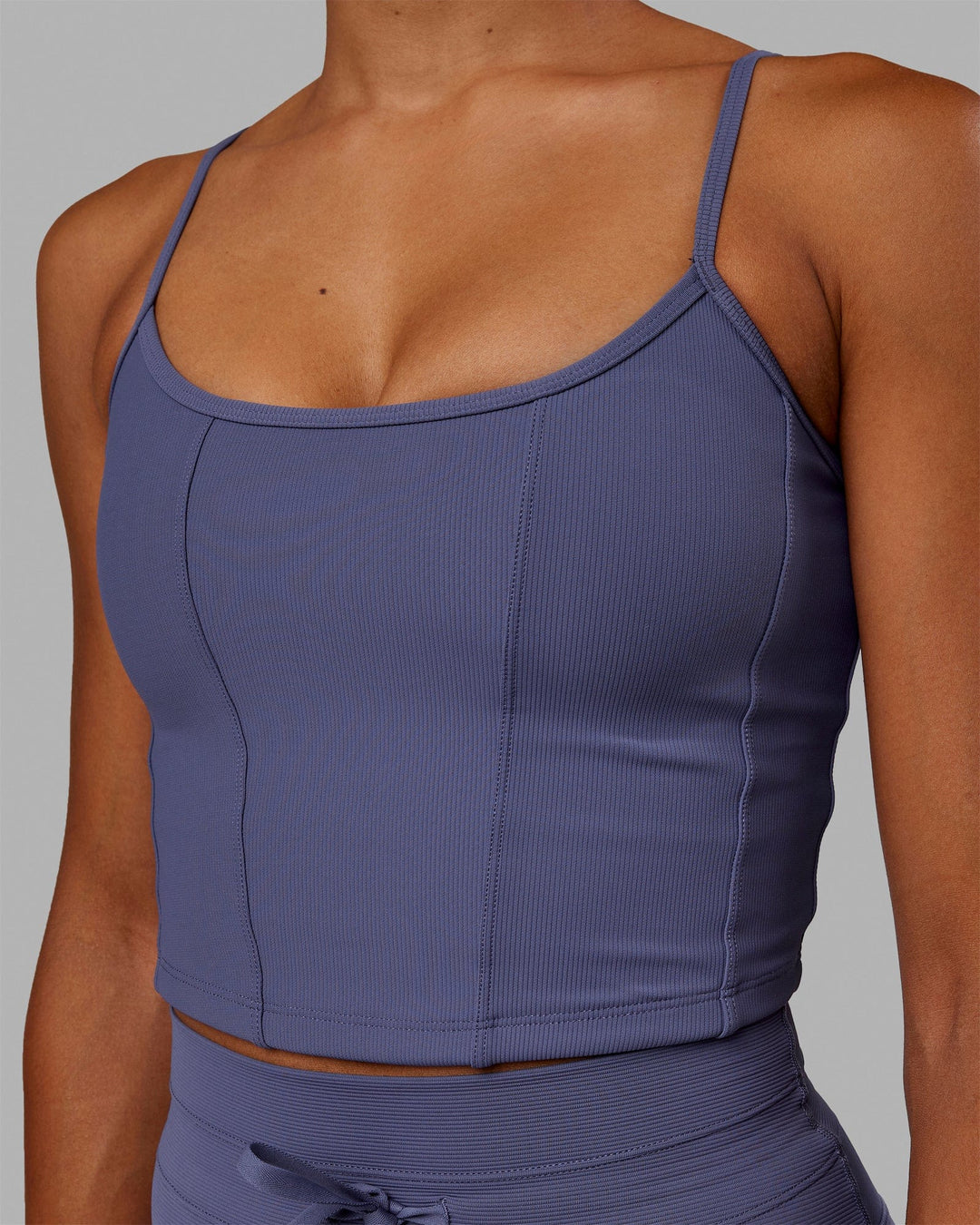 Woman wearing Resistance Ribbed Shelf Bra Performance Tank - Future Dusk