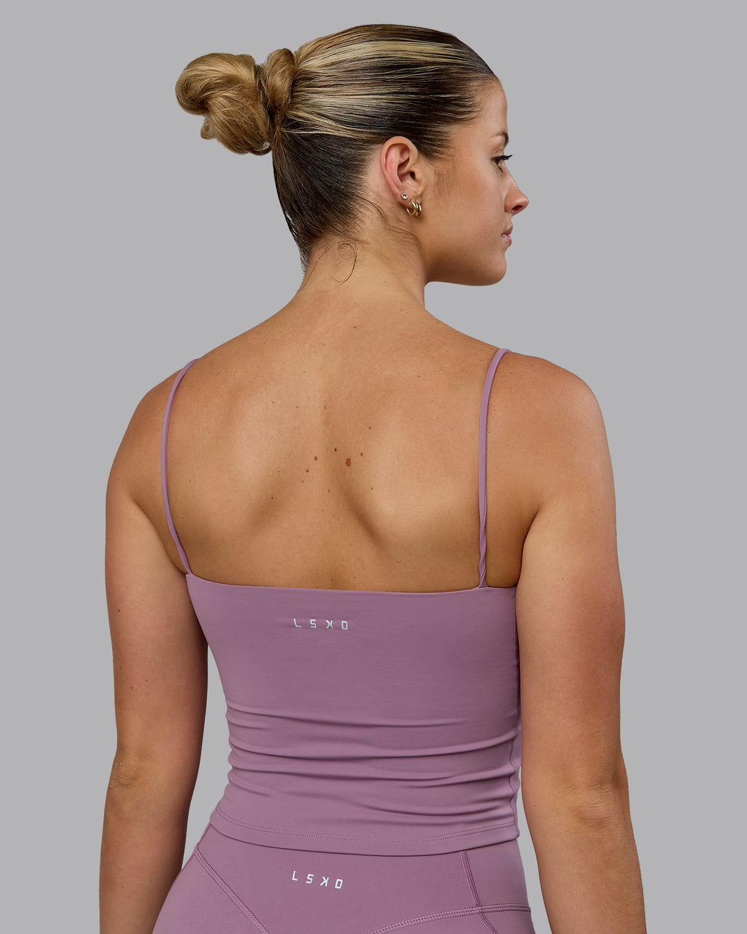 Woman wearing Revive Shelf Bra Tank - Grape