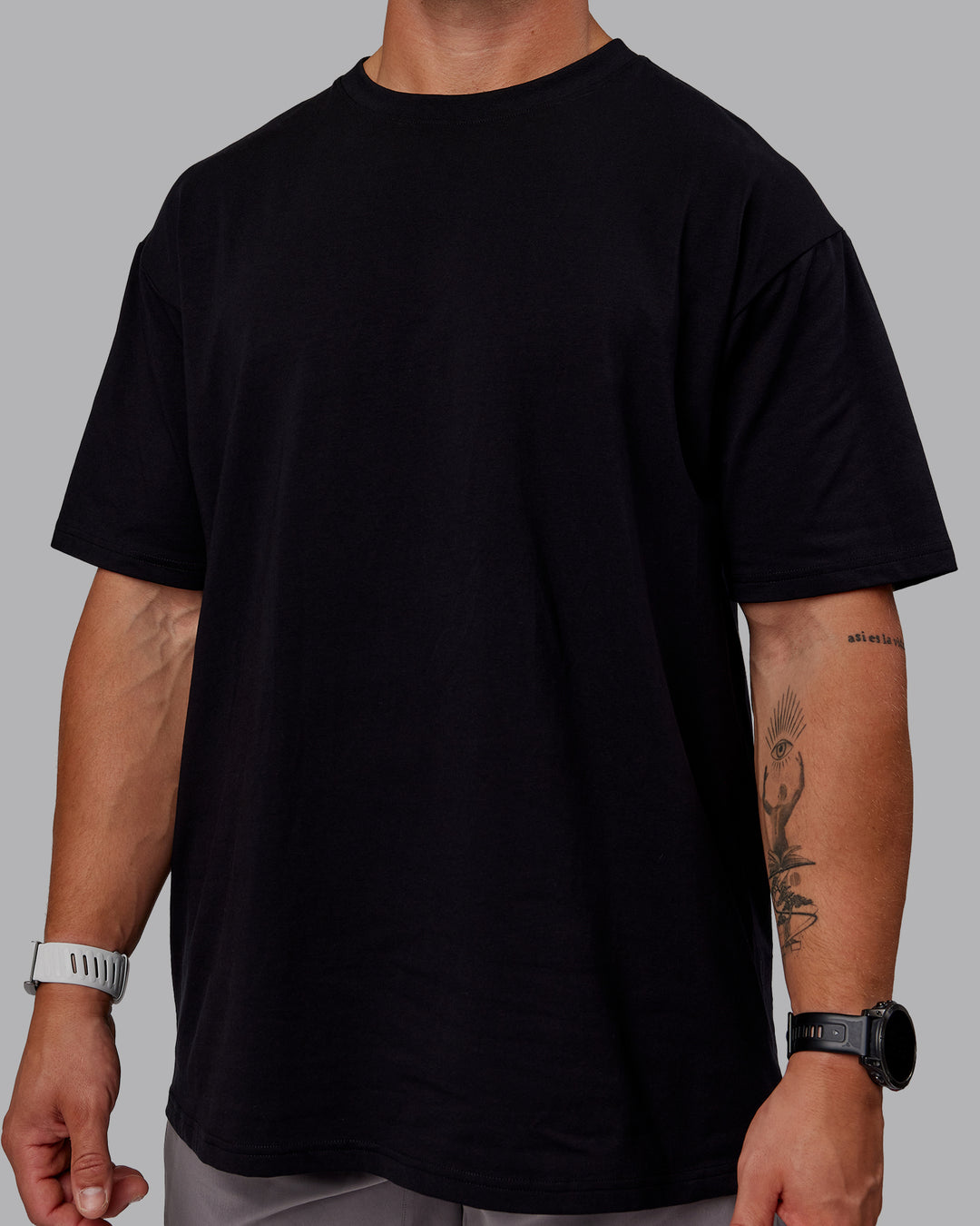 Man wearing Sara GET ÆTLA SKAL Unisex FLXCotton Tee Oversize - Black-White