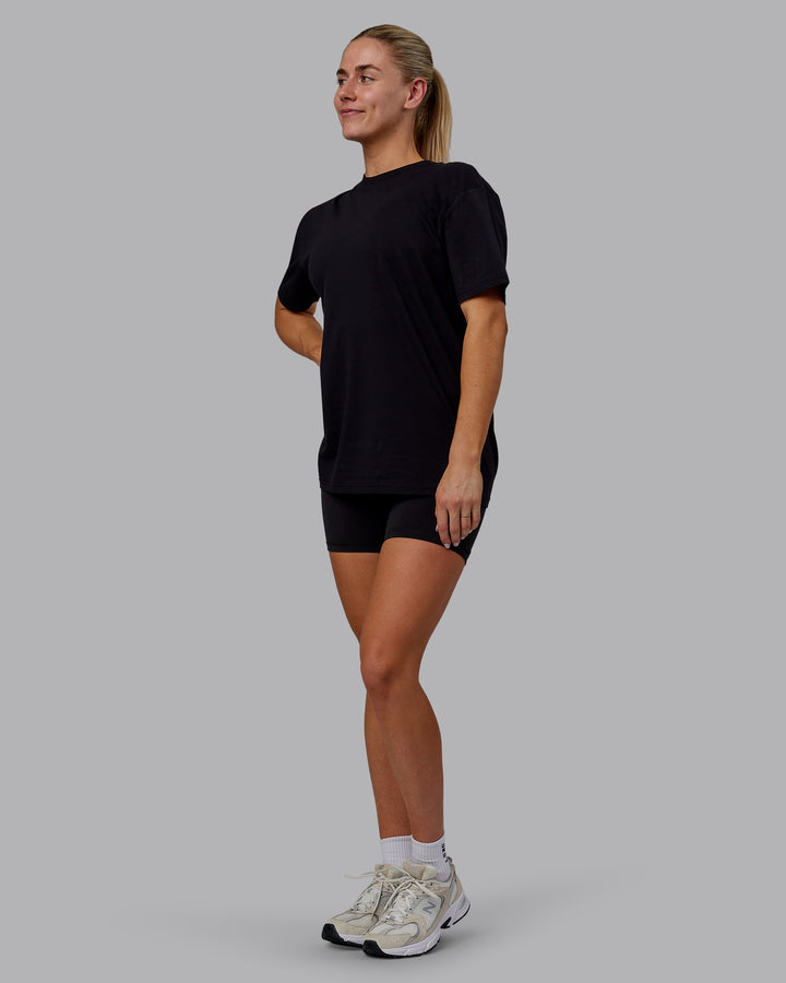 Woman wearing Sara GET ÆTLA SKAL Unisex FLXCotton Tee Oversize - Black-White
