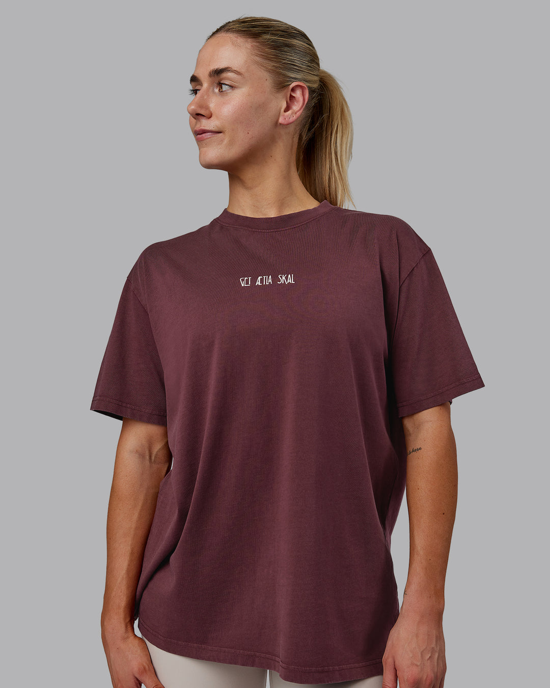 Woman wearing Sara I Can Shall &amp; Will Oversized Washed Tee - Bordeaux-Shale Beige