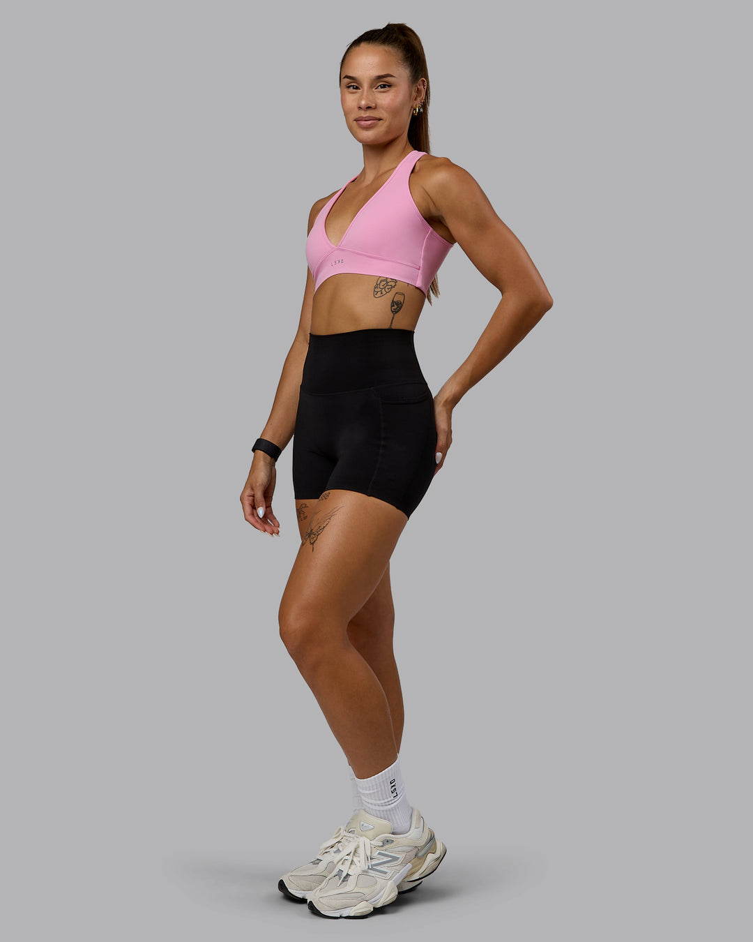 Woman wearing Stamina Sports Bra - Bubblegum