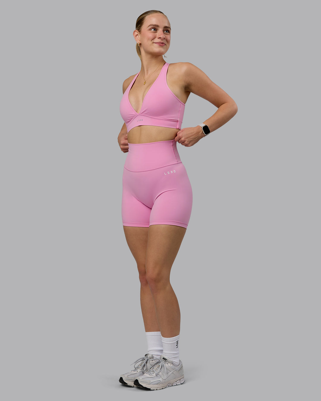 Woman wearing Stamina Sports Bra (D/DD/E) - Bubblegum