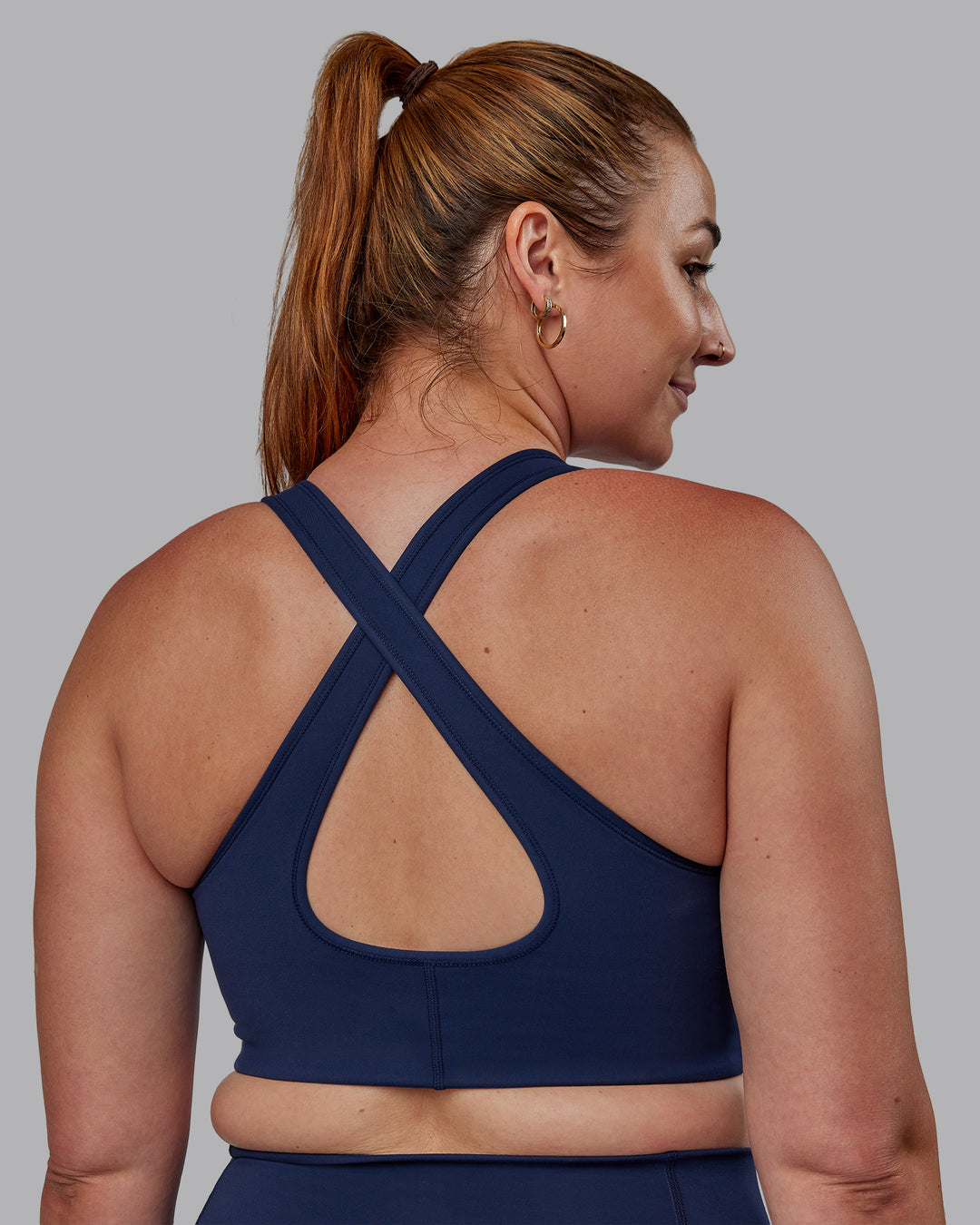 Woman wearing Stamina Sports Bra (D/DD/E) - Future Navy