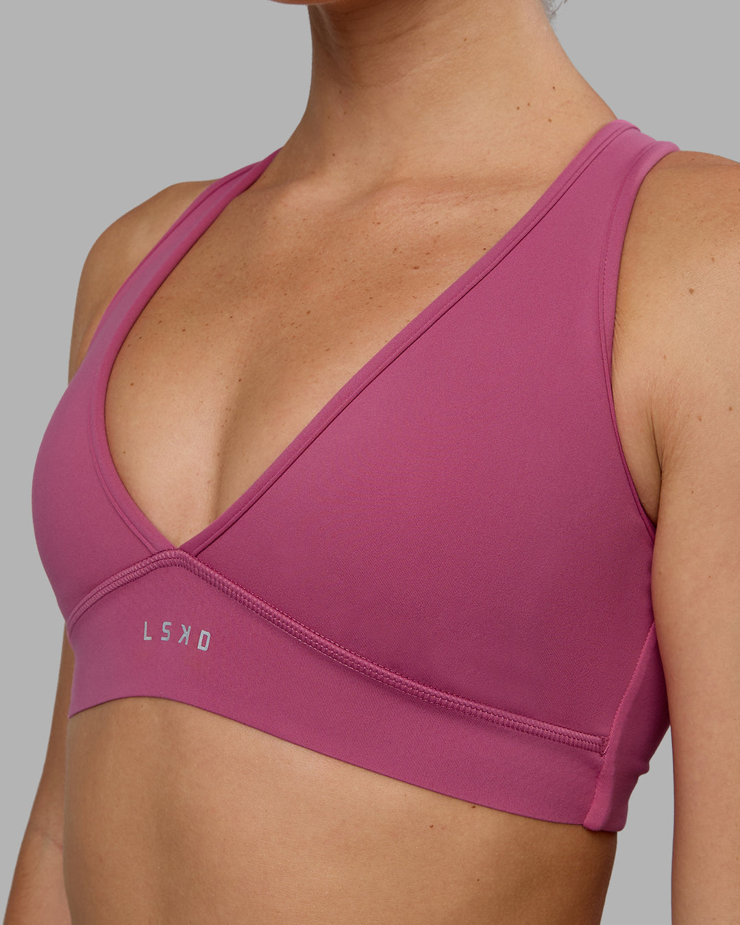 Woman wearing Stamina Sports Bra - Mauve Haze