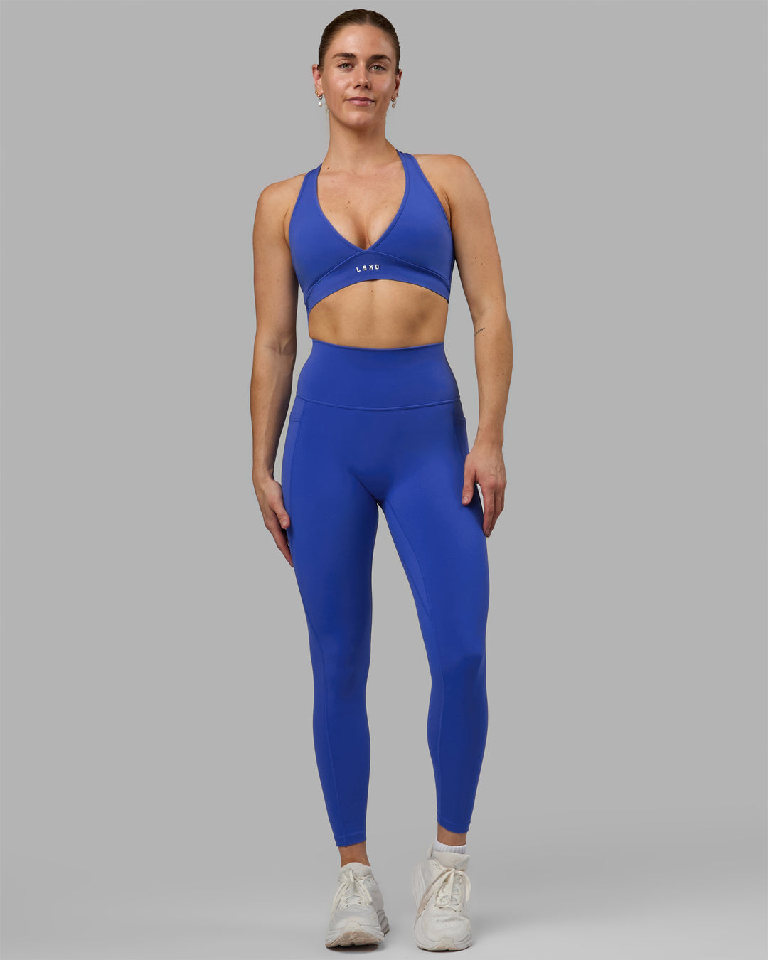 Woman wearing Stamina Sports Bra - Power Cobalt