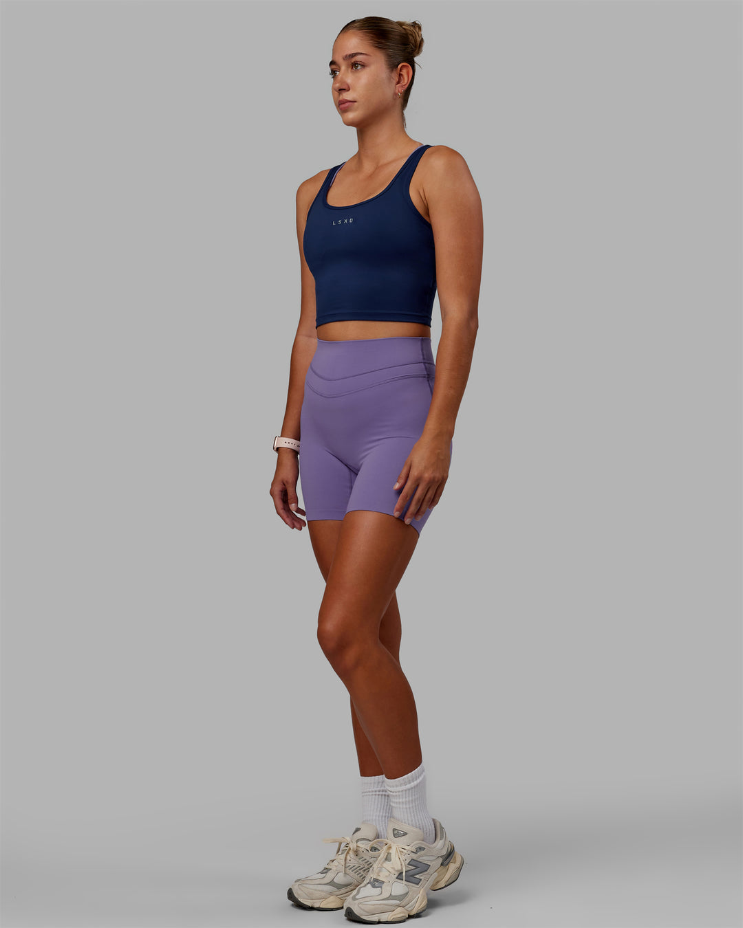 Woman wearing Staple Active Cropped Tank - Midnight Blue