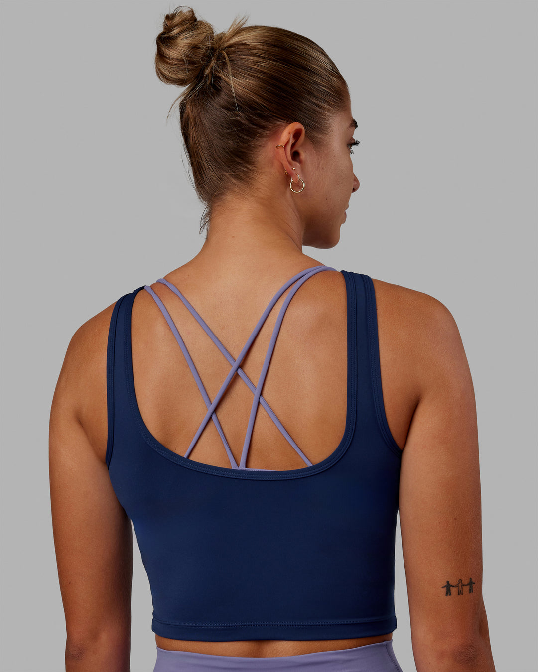 Woman wearing Staple Active Cropped Tank - Midnight Blue