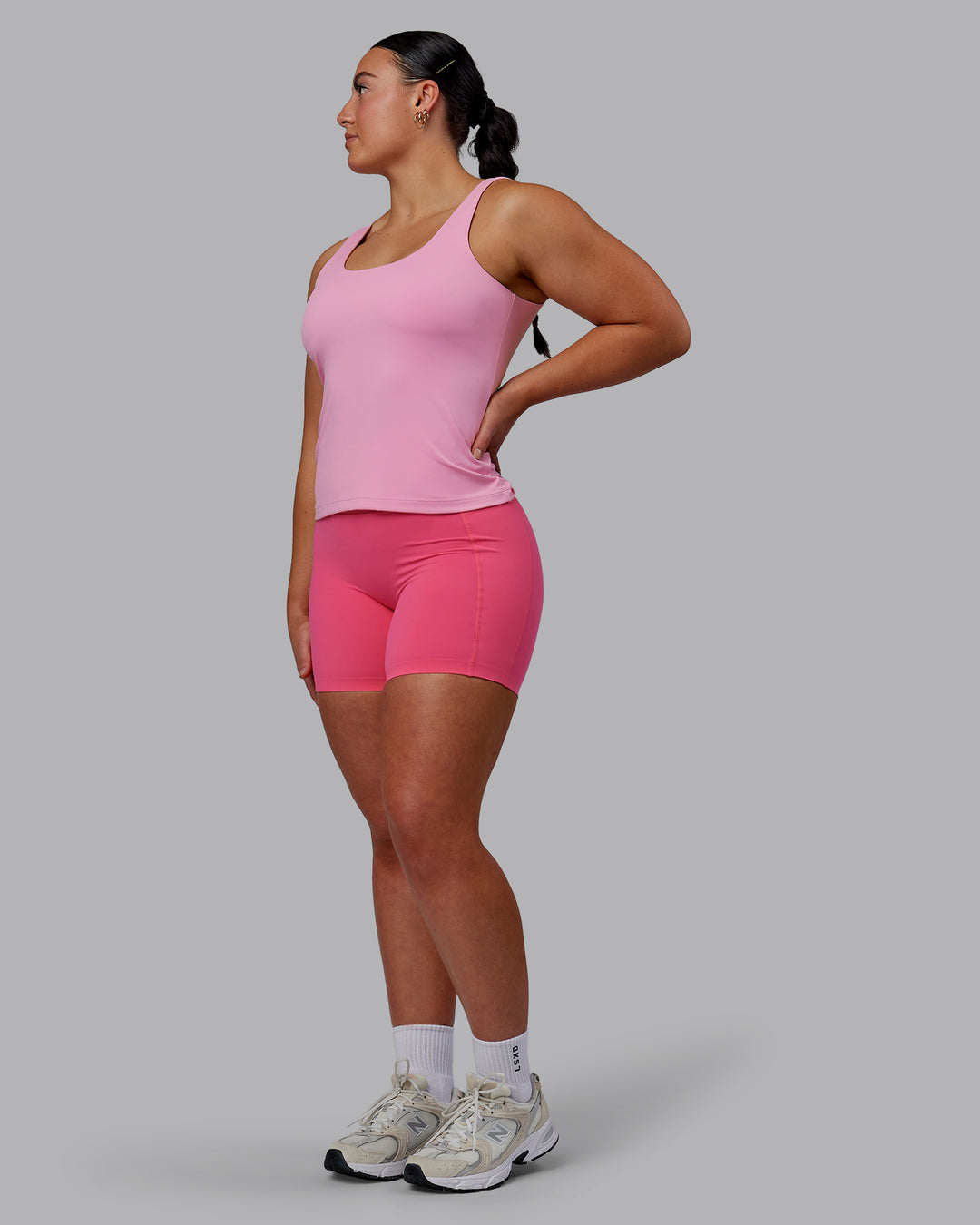 Woman wearing Staple Active Shelf Bra Tank - Bubblegum