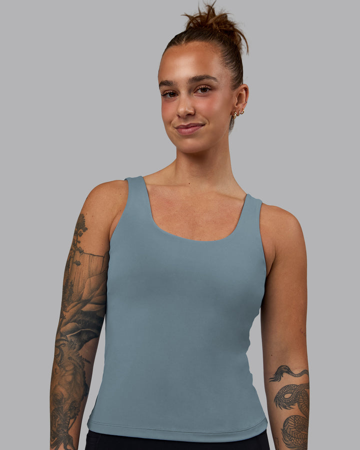 Woman wearing Staple Active Shelf Bra Tank - Elemental Blue
