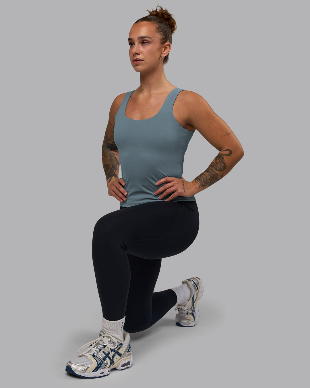 Woman wearing Staple Active Shelf Bra Tank - Elemental Blue