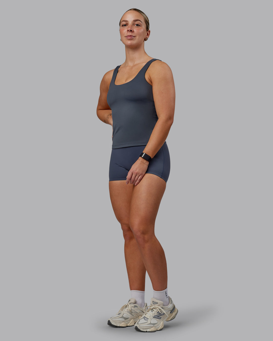 Woman wearing Staple Active Shelf Bra Tank - Turbulence