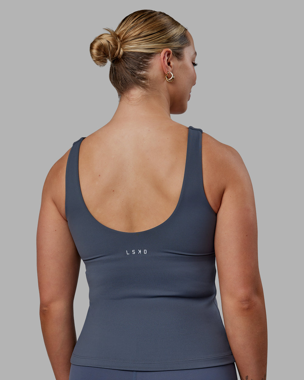 Woman wearing Staple Active Shelf Bra Tank - Turbulence