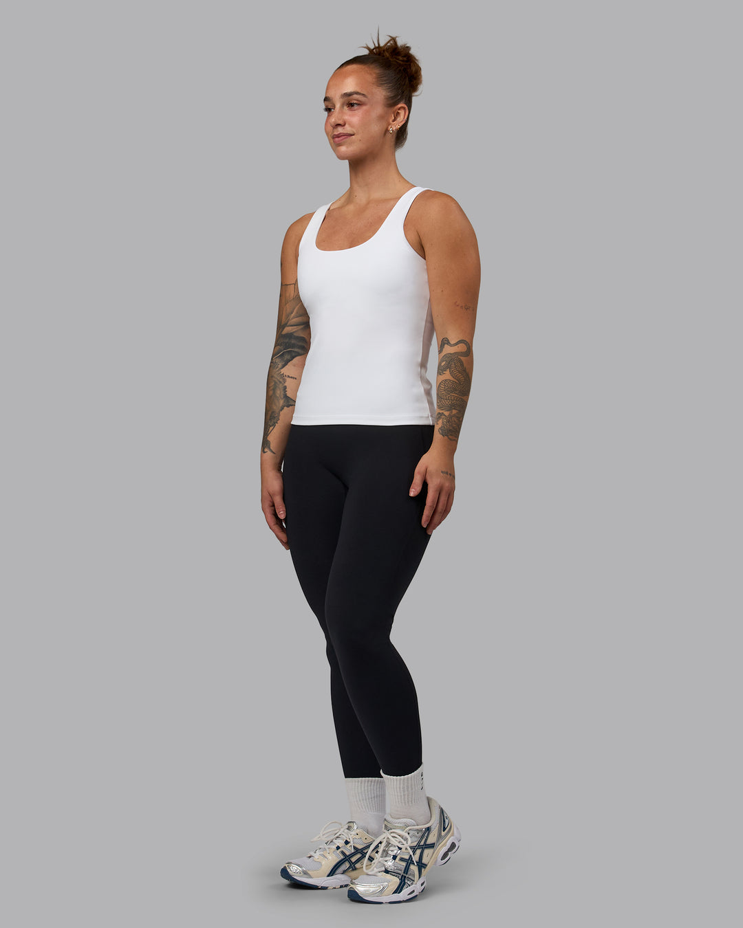 Woman wearing Staple Active Shelf Bra Tank - White