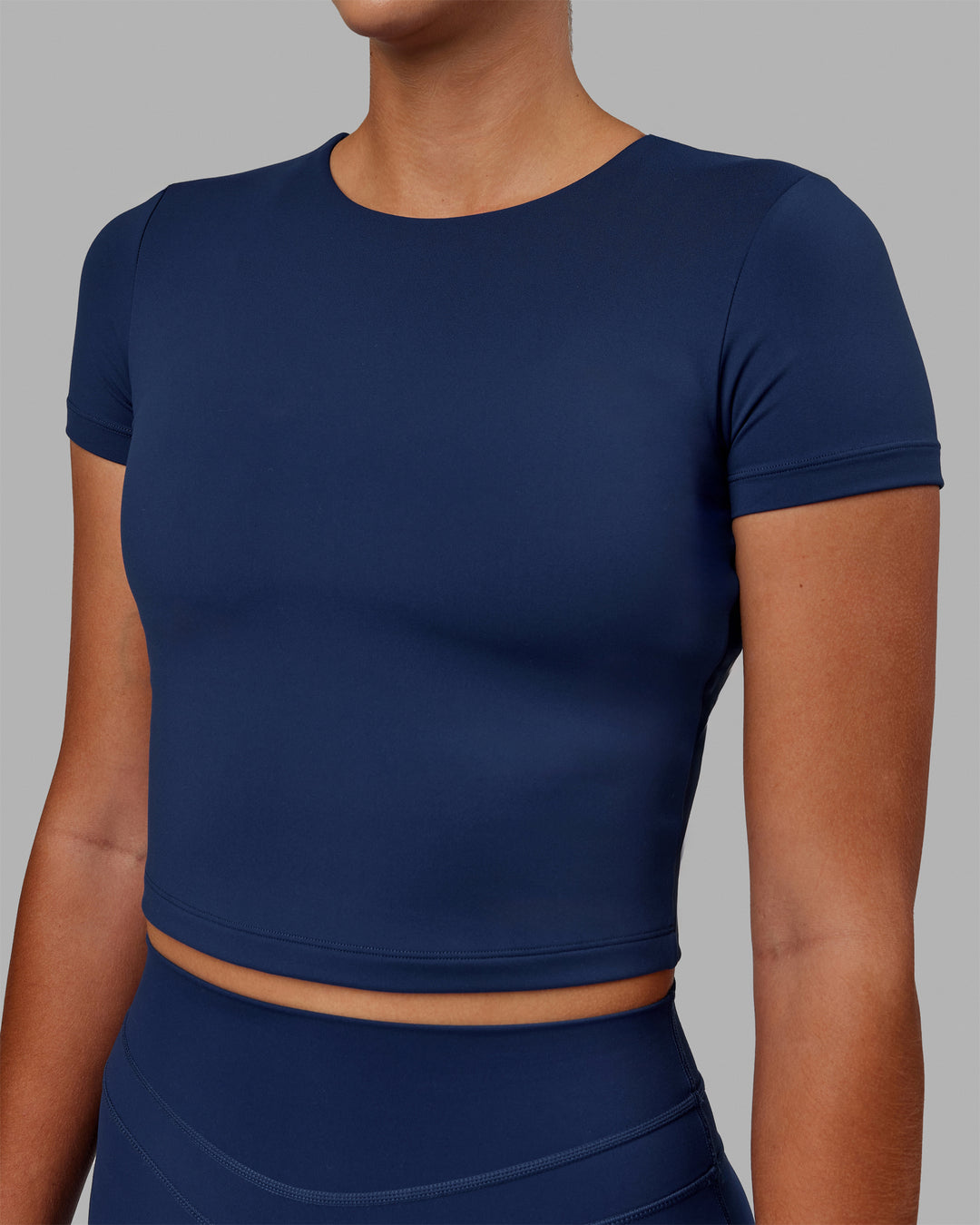 Woman wearing Staple Cropped Tee - Midnight Blue