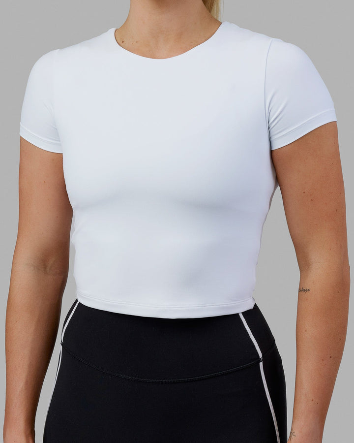 Woman wearing Staple Cropped Tee - White
