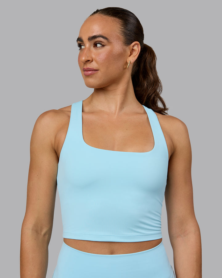 Woman wearing Staple Square Neck Active Shelf Bra Tank - Crystal Blue
