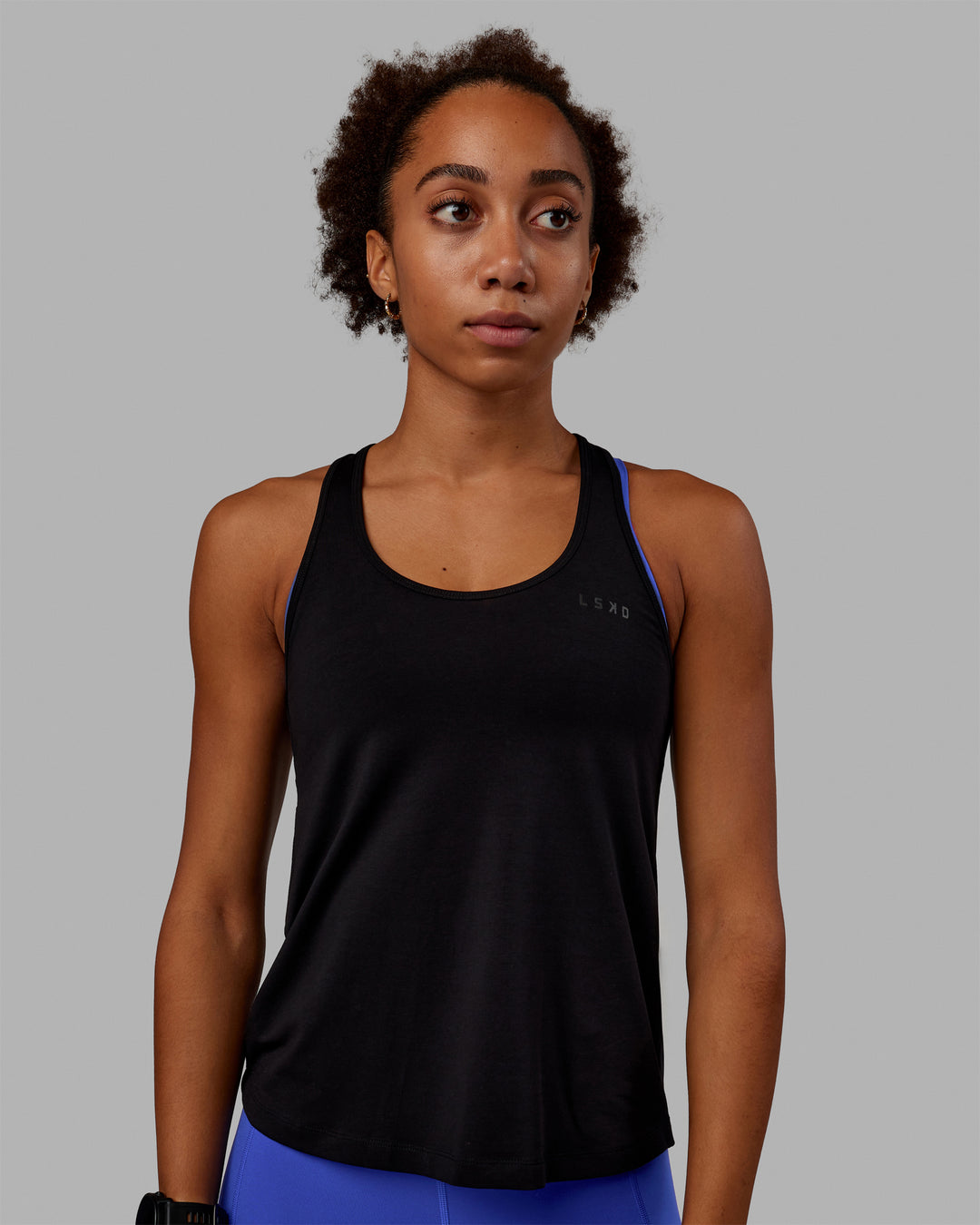 Woman wearing Static PimaFLX-Lite Tank - Black