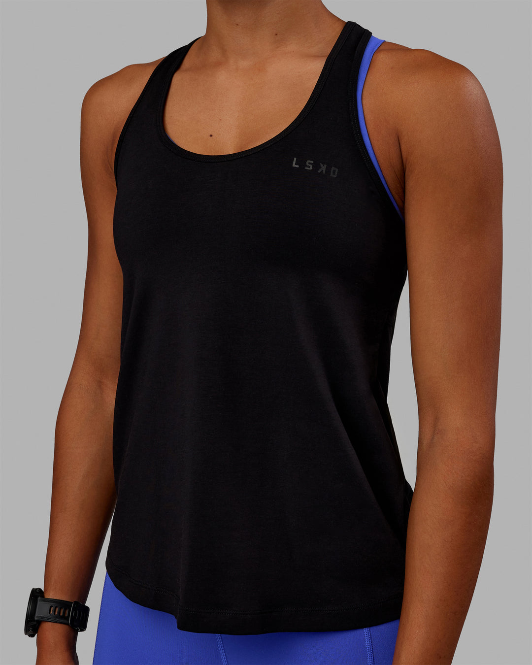 Woman wearing Static PimaFLX-Lite Tank - Black