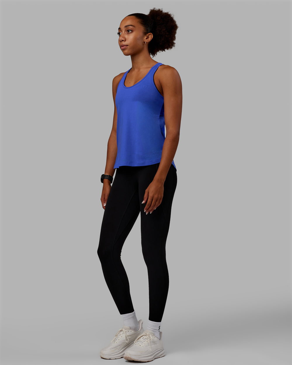 Woman wearing Static PimaFLX-Lite Tank - Power Cobalt