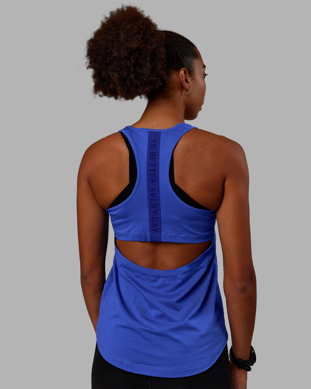 Woman wearing Static PimaFLX-Lite Tank - Power Cobalt