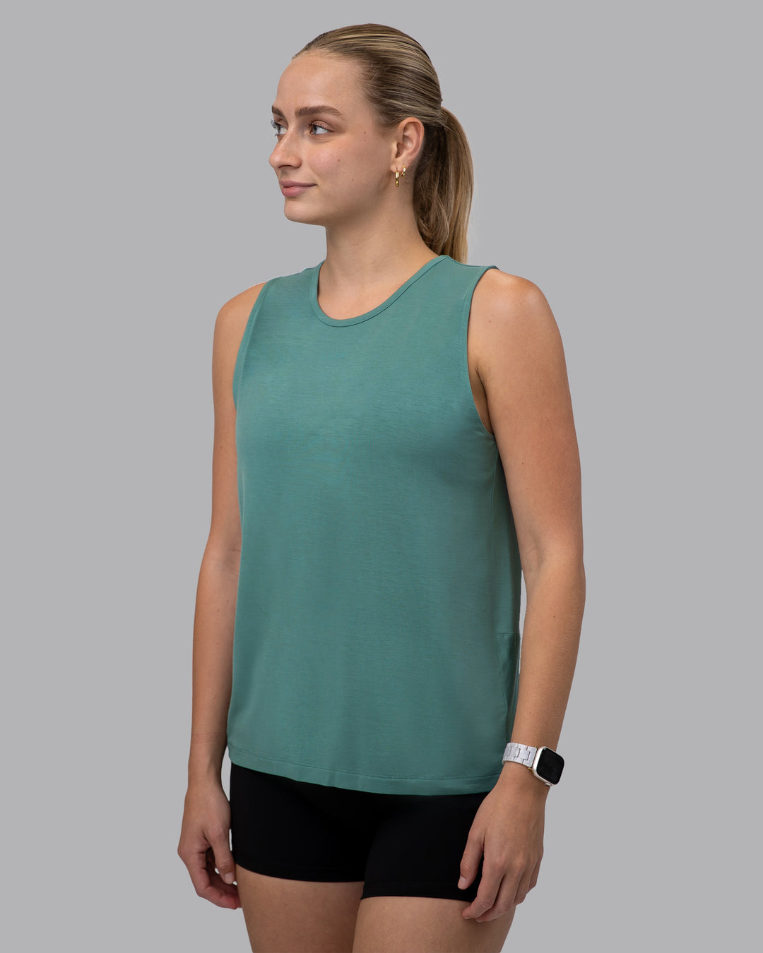 Woman wearing Swivel Open Back Tank - Sagebrush