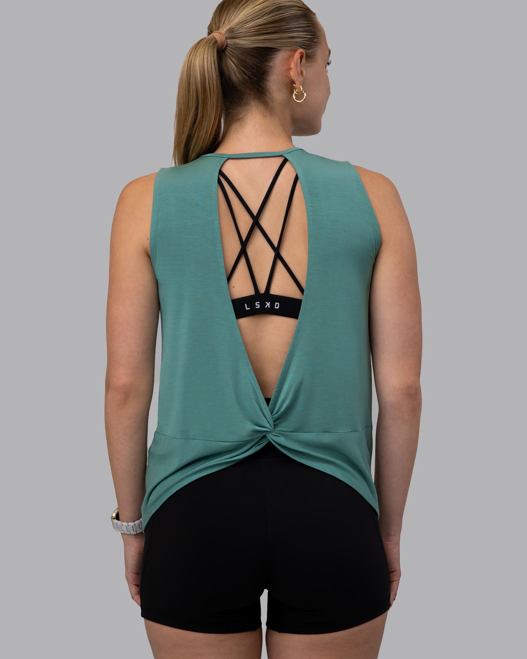 Woman wearing Swivel Open Back Tank - Sagebrush