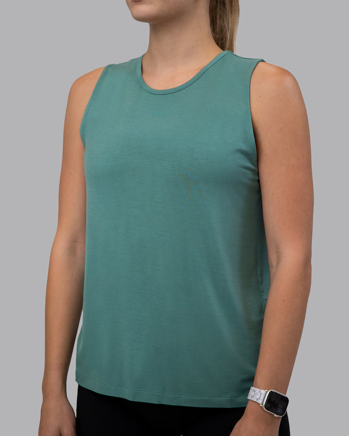 Woman wearing Swivel Open Back Tank - Sagebrush
