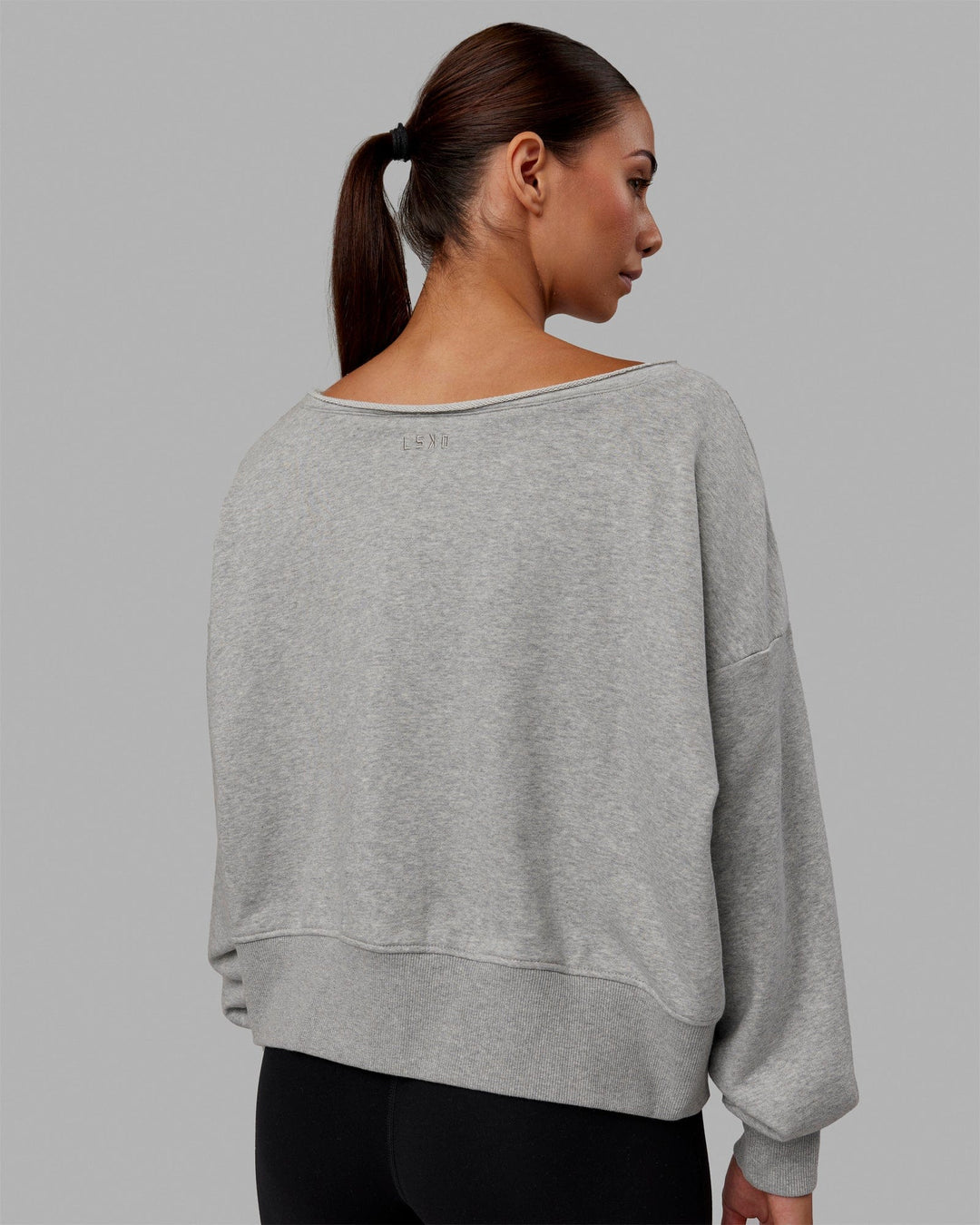 Woman wearing Tempo Sweater - Light Grey Marl