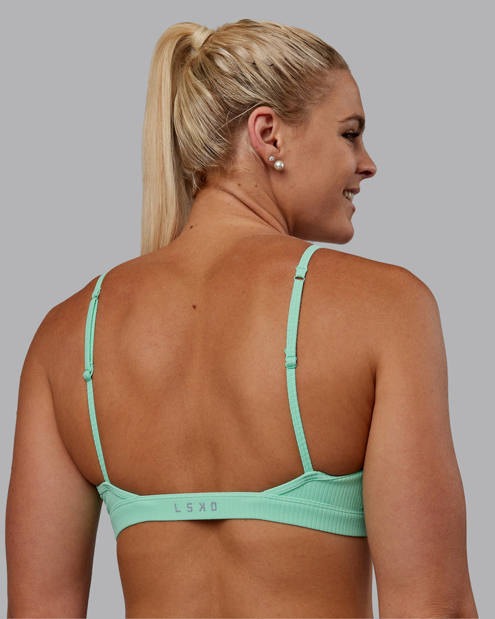 Woman wearing Tenacity Ribbed Lounge Bra - Ice Green
