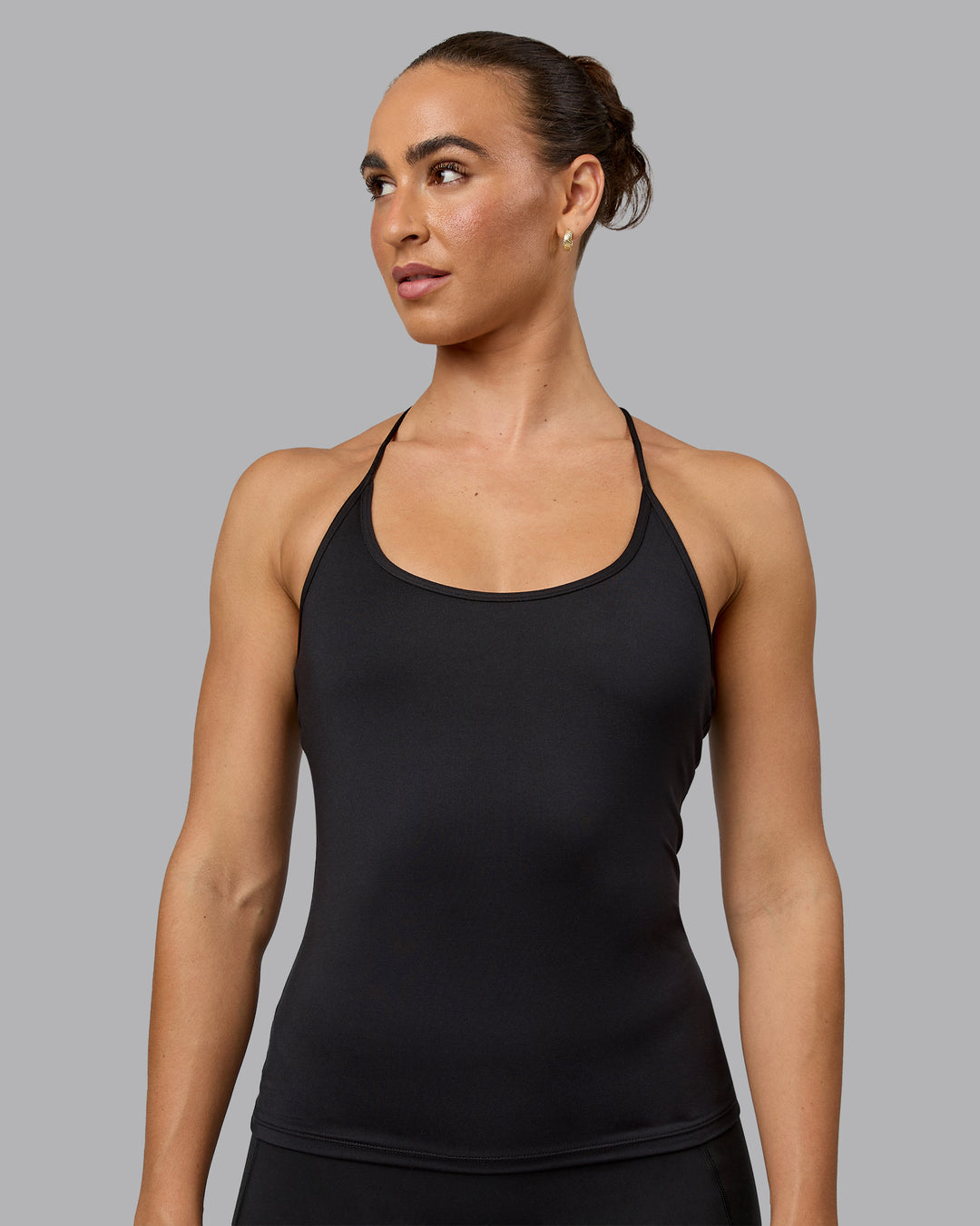 Woman wearing Transition CloudFLX Shelf Bra Tank - Black