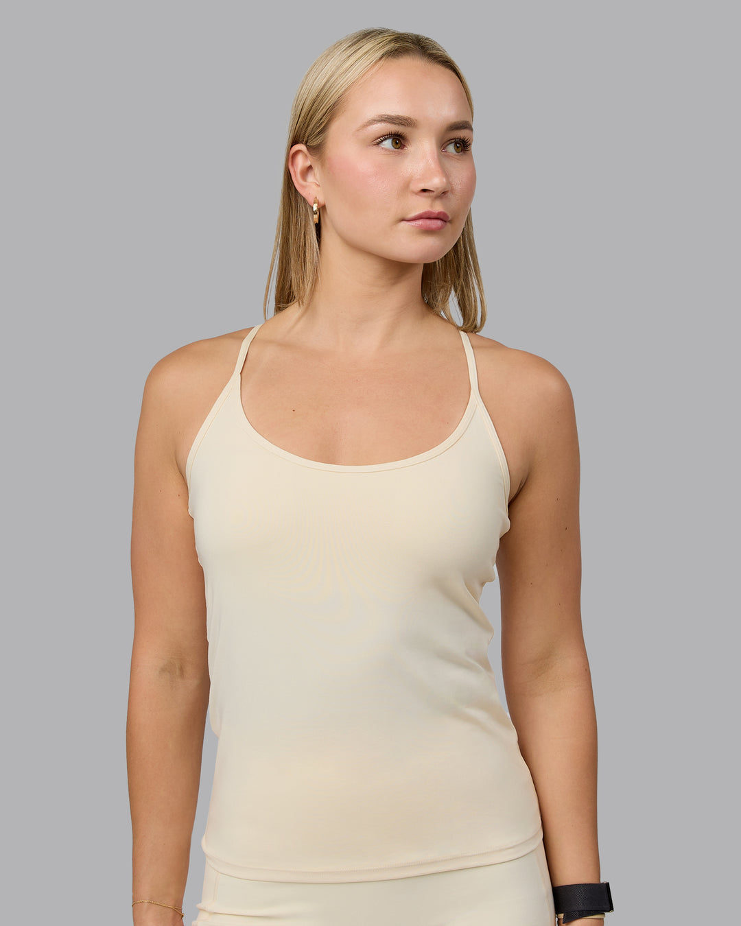 Woman wearing Transition CloudFLX Shelf Bra Tank - Ivory