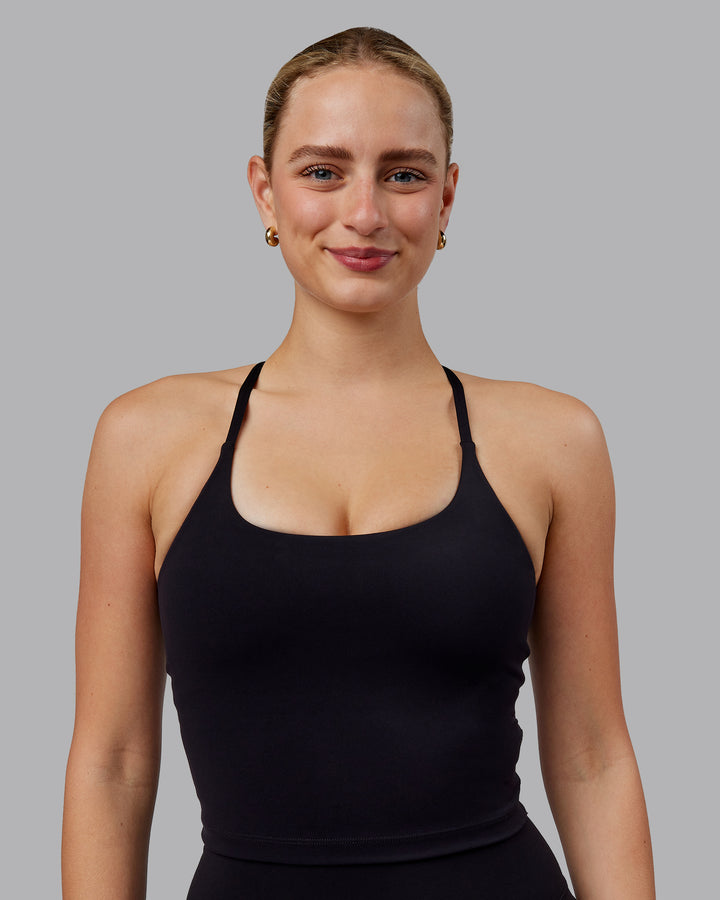 Woman wearing Twist Shelf Bra Tank - Black
