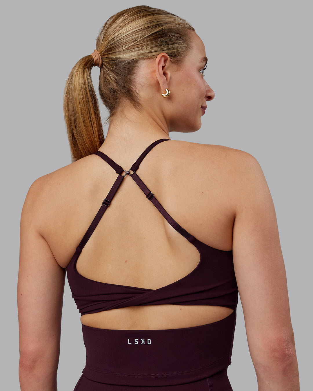 Woman wearing Twist Shelf Bra Tank - Mulberry