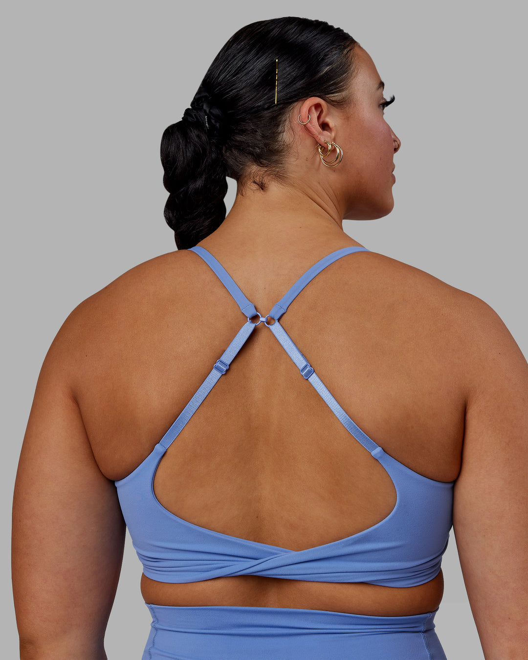 Woman wearing Twist Sports Bra - Ultramarine