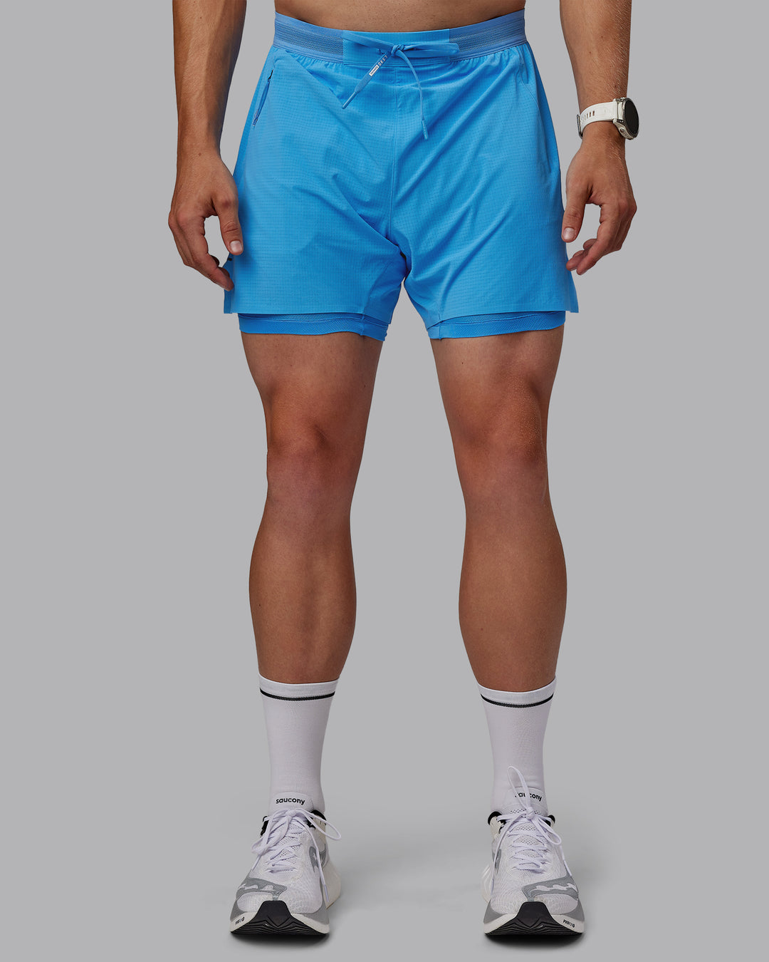 Man wearing UltraAir 5&quot; Lined Performance Shorts - Azure Blue