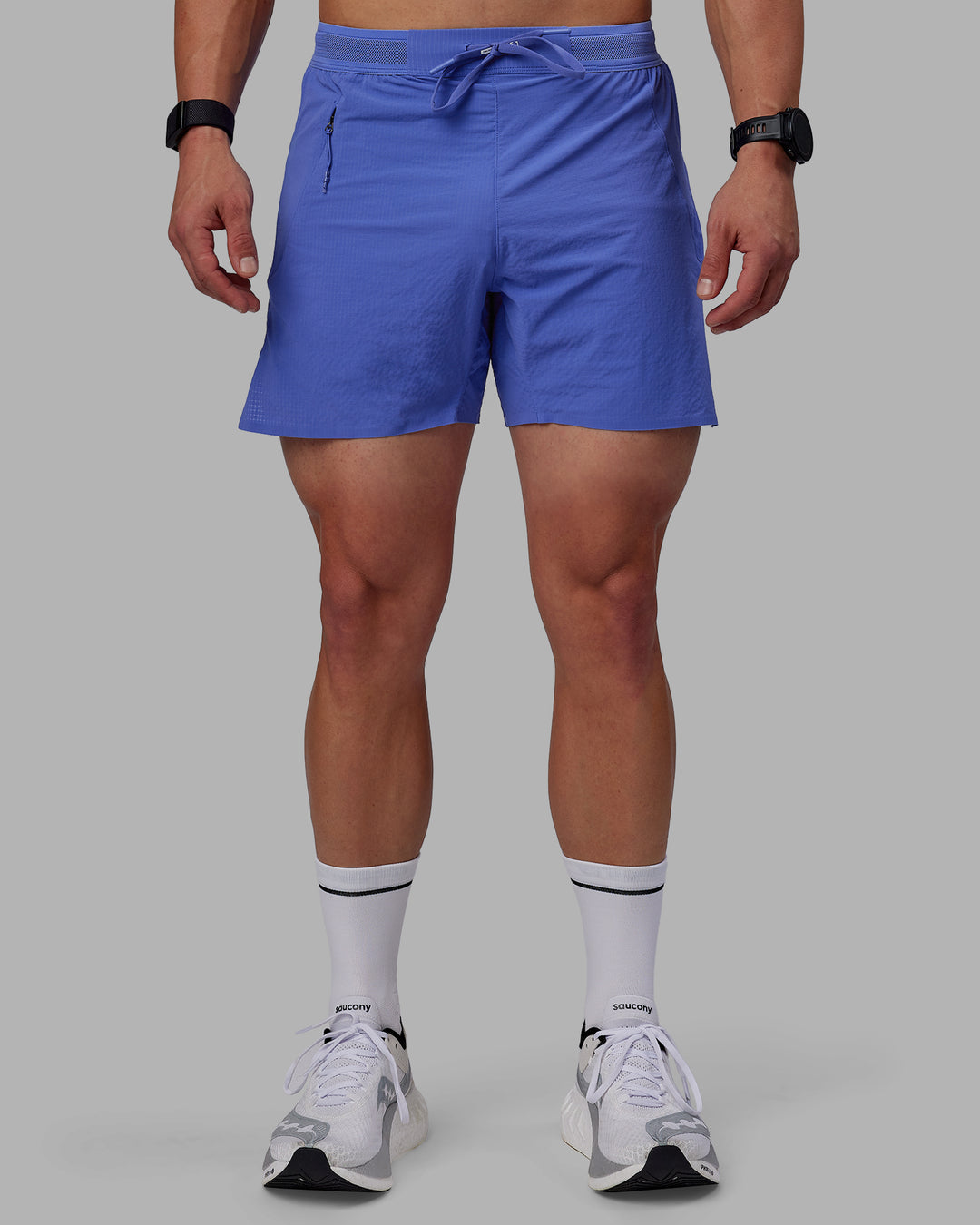 Man wearing UltraAir 5&quot; Lined Performance Shorts - Baja Blue-Reflective