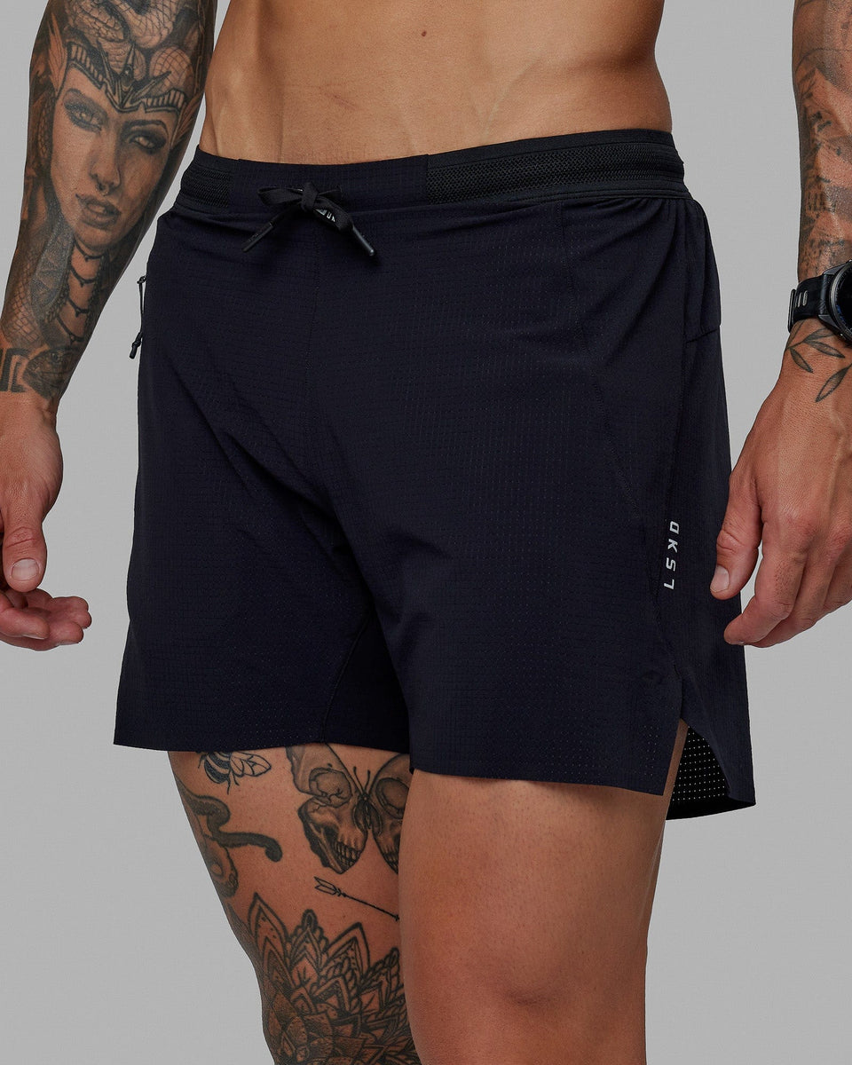 Man wearing UltraAir 5" Lined Performance Short - Black-Reflective