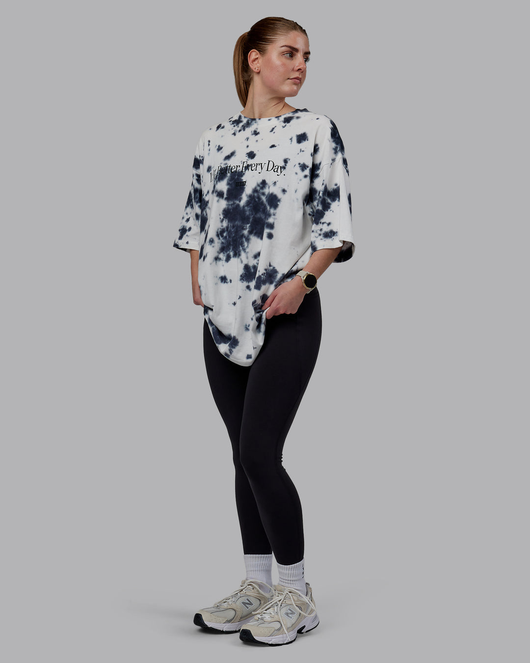 Woman wearing Unisex 1% Better Heavyweight Tee Oversize - White-Black Tie Dye