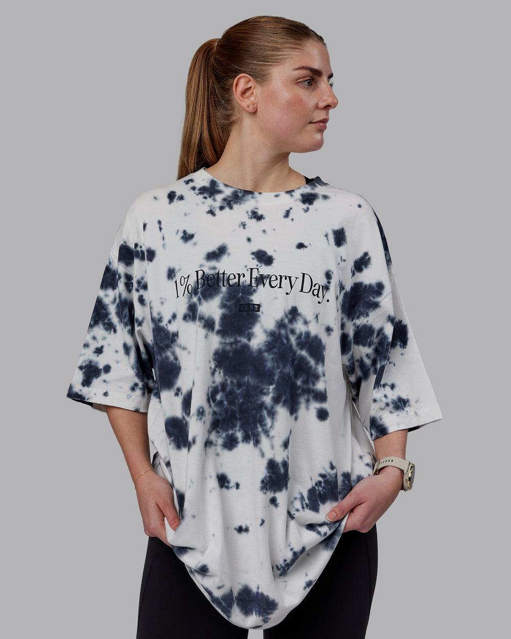 Woman wearing Unisex 1% Better Heavyweight Tee Oversize - White-Black Tie Dye