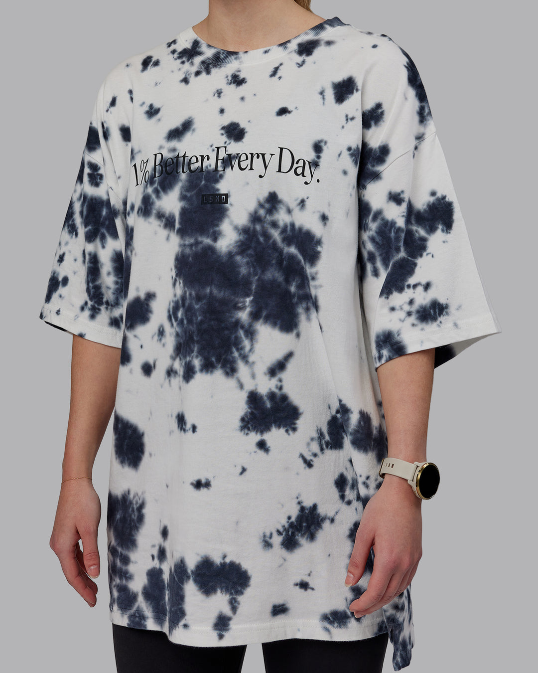 Woman wearing Unisex 1% Better Heavyweight Tee Oversize - White-Black Tie Dye