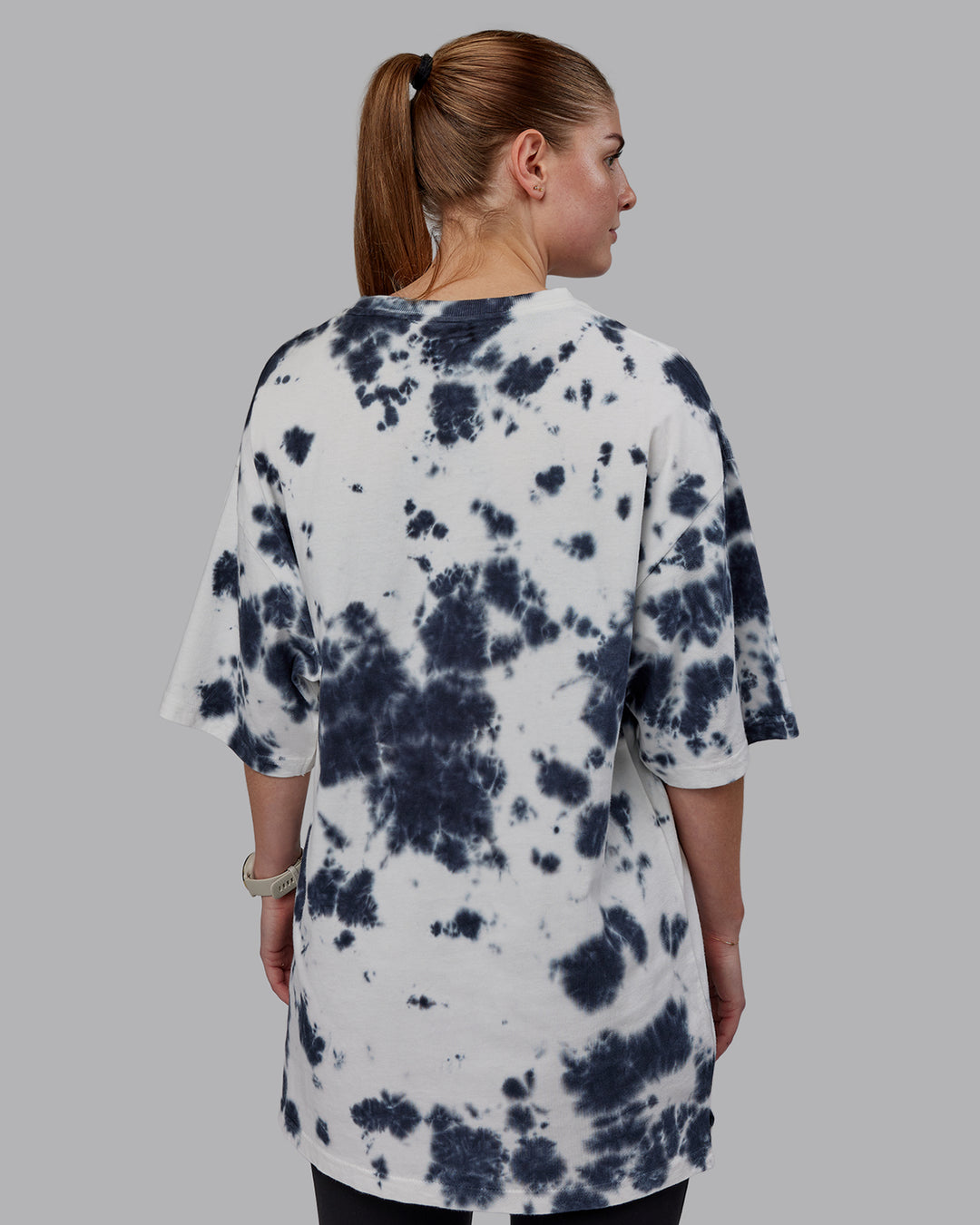 Woman wearing Unisex 1% Better Heavyweight Tee Oversize - White-Black Tie Dye