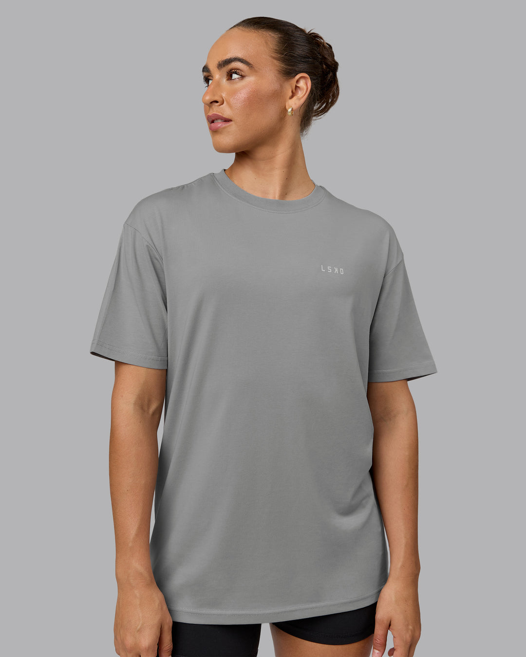 Woman wearing Unisex 1% Better Value Series FLXCotton Tee Oversize - Circular Grey-White