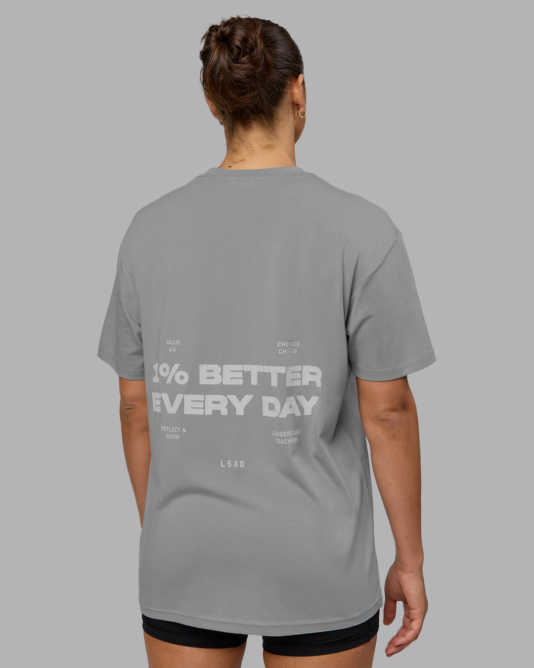 Woman wearing Unisex 1% Better Value Series FLXCotton Tee Oversize - Circular Grey-White