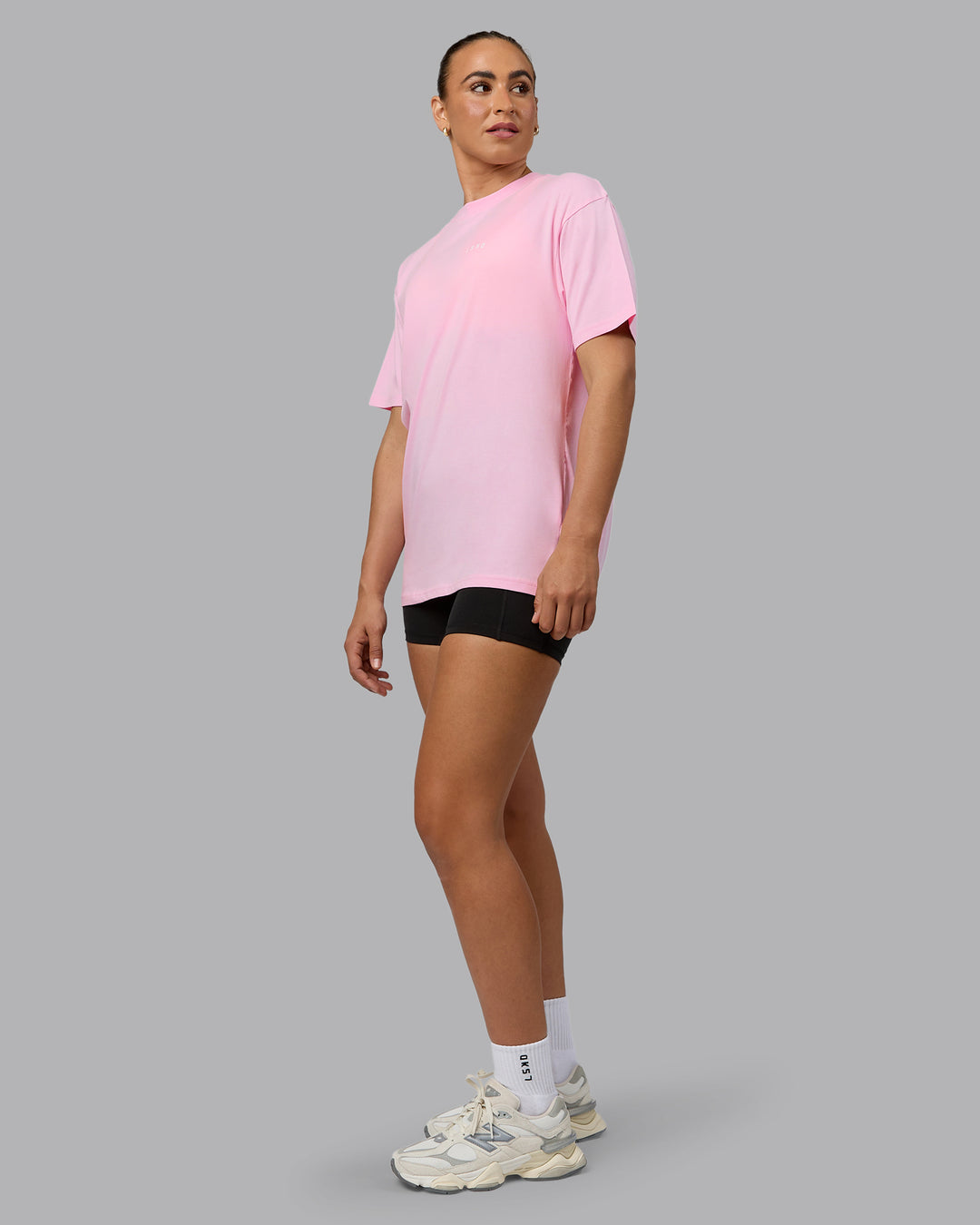 Woman wearing Unisex 1% Better Value Series FLXCotton Tee Oversize - Pale Pink-White